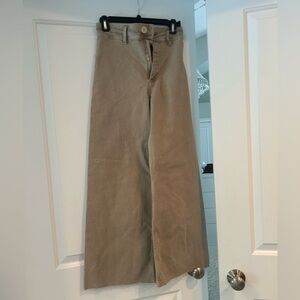 Tan women’s Zara jeans